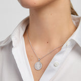 History of Ireland disc pendant on a model