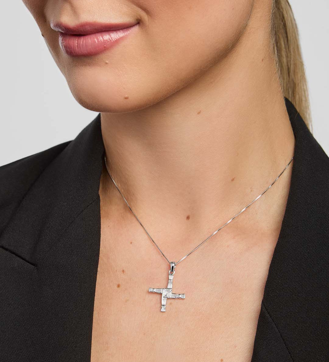 a female model wearing St Brigid's Cross pendant from Solvar