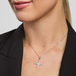 a female model wearing St Brigid's Cross pendant from Solvar