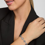 a woman wearing trinity knot link bracelet from Solvar