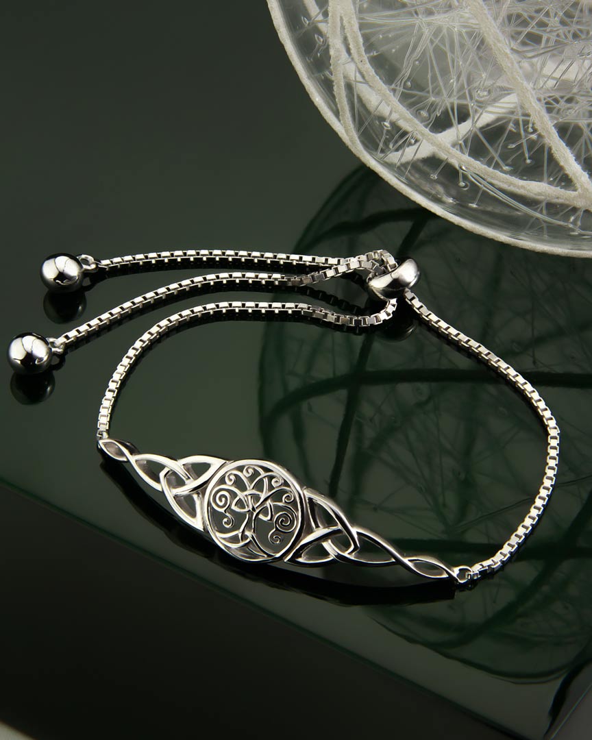 styled image of Celtic tree of life bracelet from Solvar on green background