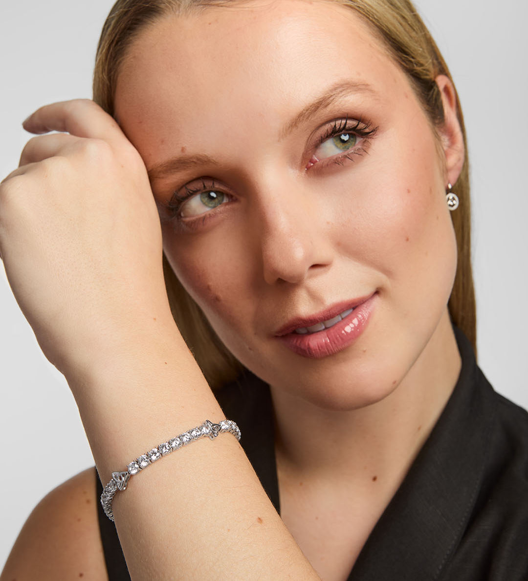 a woman wearing celtic cz tennis bracelet from Solvar