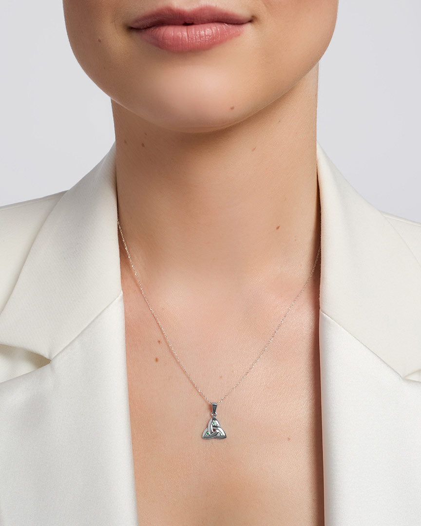 14k white gold emerald trinity knot pendant s4717 from Solvar on a model