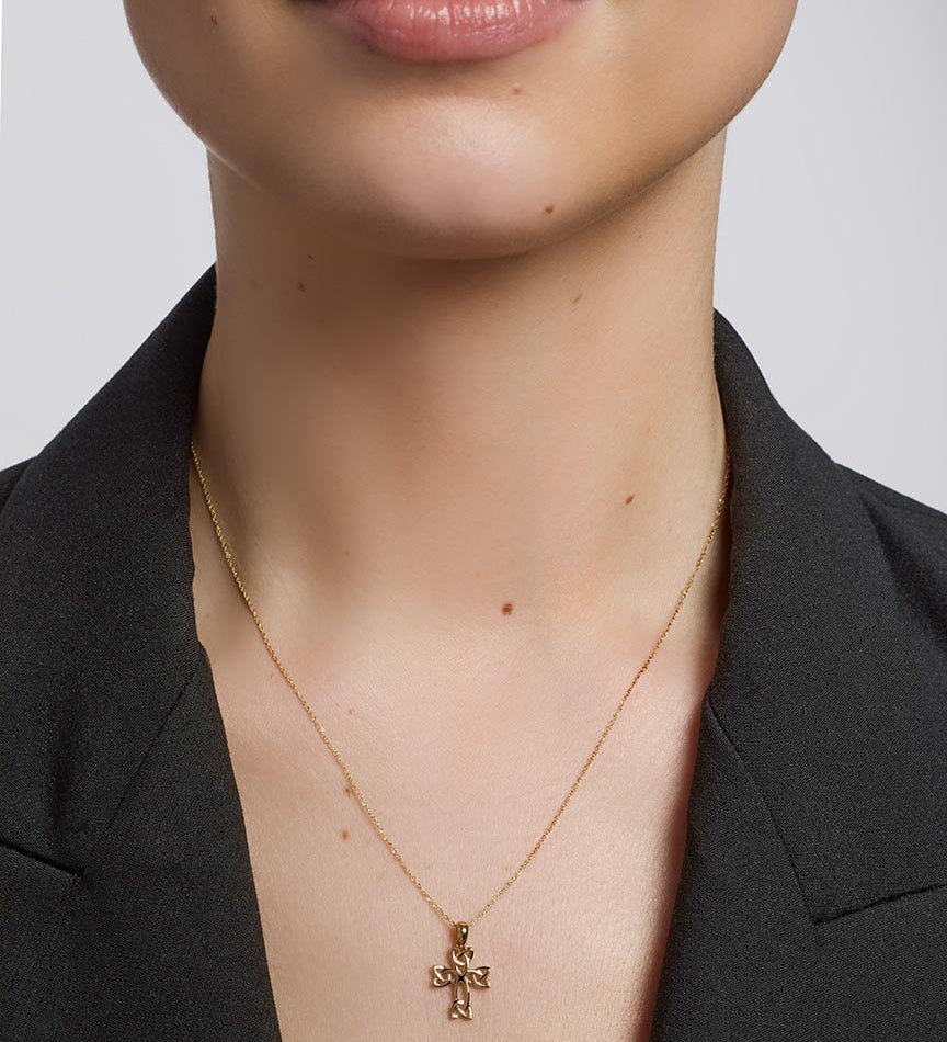10 karat gold Celtic Cross pendant S47033 from Solvar jewellery on a model